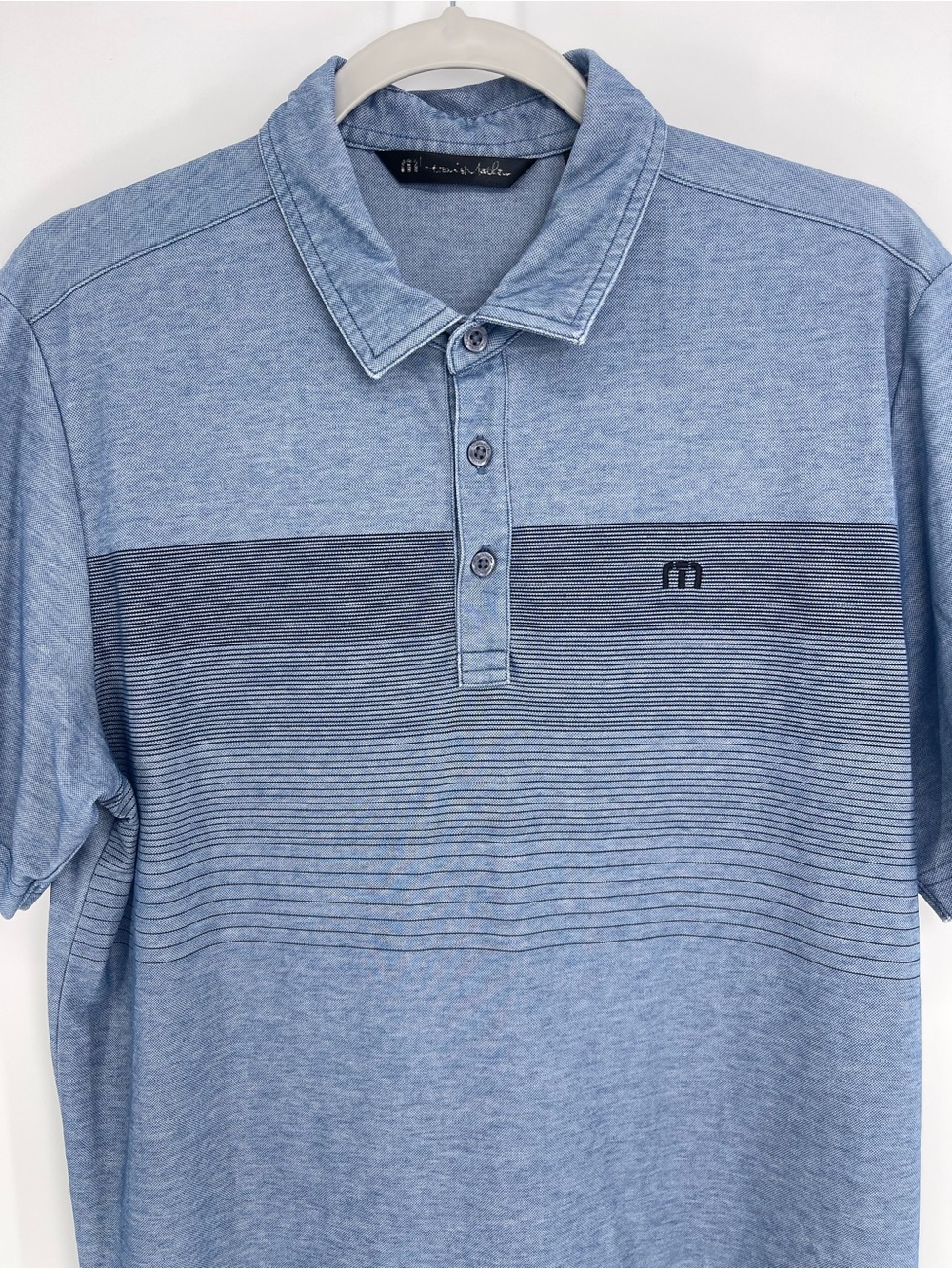 Travis Mathew Heather Light Blue Polo with Navy Micro-Stripe Chest